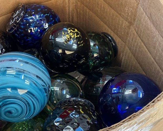 Hand-blown glass ornaments made by artists at Fine Line Creative Arts Center in St. Charles will be among those hidden along Kane County trails in Elgin and St. Charles as part of the Great Orb Hunt, which starts Thursday. (Fine Line Creative Arts Center)