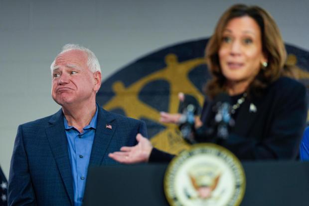 Democratic presidential nominee Vice President Kamala Harris, with Democratic vice presidential nominee Minnesota Gov. Tim Walz, left, speaks at a campaign rally at UAW Local 900, Thursday, August 8, 2024, in Wayne, Mich. (AP Photo/Julia Nikhinson)