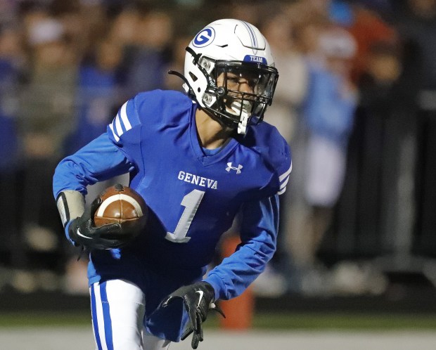 Geneva's Talyn Taylor (1) returns a kickoff in the second half against Geneva during a DuKane Conference game in Geneva on Friday, Sept. 23, 2022.