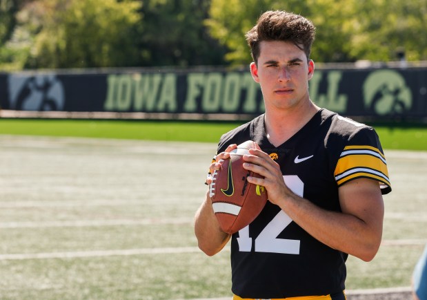 Iowa quarterback Cade McNamara poses during media day on Aug. 11, 2023, in Iowa City, Iowa.