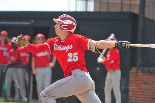 Homewood-Flossmoor's Jacob Schroeder connect against St. Laurence on Tuesday, July 11, 2018.