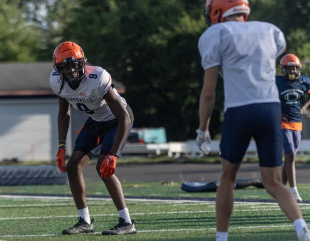 Naperville North's Kaiser Williams (9) participates in a coverage drill during practice in Naperville on Wednesday, July 17, 2024. (Troy Stolt/for the Naperville Sun)