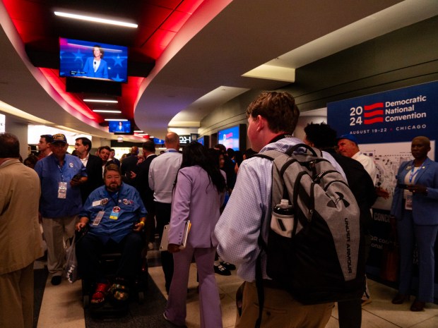 Naperville Central High School senior C.J. Getting walks through Chicago's United Center during the Democratic National Convention's first night of programming on Monday, Aug. 21, 2024. (Tess Kenny/Naperville Sun)