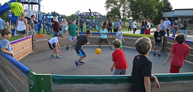 Children play in the gaga ball pit during the Isaac Fox Elementary School "Back to School Bash" on Aug. 23, 2024 in Lake Zurich. The event celebrates the start of the news school year. (Karie Angell Luc/Pioneer Press)