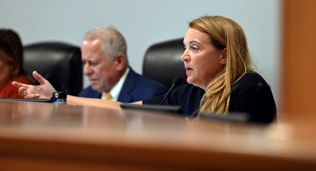 Right, Northbrook Village Trustee Johannah K. Hebl at the dais in the boardroom at Northbrook Village Hall on Aug. 27, 2024. (Karie Angell Luc/Pioneer Press)