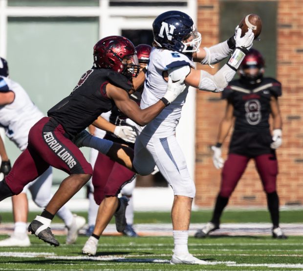 Nazareth's Gabe Kaminski (5) catches a pass against Peoria during the Class 5A state championship game at Memorial Stadium in Champaign on Saturday, Nov. 26, 2022. (Vincent D. Johnson / Pioneer Press)