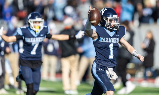 Nazareth quarterback Logan Malachuk (1) celebrates at the end of the Class 5A state championship game against Joliet Catholic at Illinois State University's Hancock Stadium in Normal on Saturday, Nov. 25, 2023. (Vincent D. Johnson / Daily Southtown)