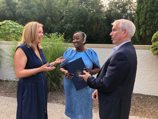 Glencoe Village Trustee Hilary Scott (left) chats with Reverend Celona Hayes Adebayo and Cook County Commissioner Scott Britton, 14th. (Daniel I. Dorfman/Pioneer Press)