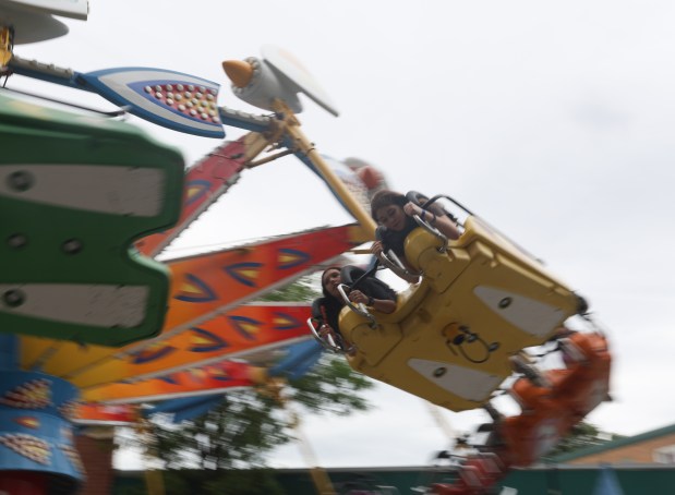 Fairgoers enjoy a ride during Franklin Park Festival in Franklin Park on Saturday, June 8, 2024. (Trent Sprague/for the Pioneer Press)