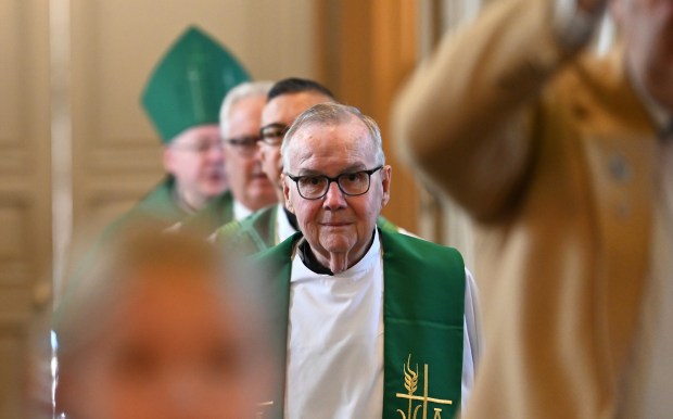 From left, during the special mass processional are Bishop Jeffrey Grob of Elmwood Park, Rev. Jeremiah Boland, OLPH pastor, Rev. Larry Basbas, OLPH associate pastor, and Rev. James Barrett, resident, at the dedication and blessing of the church bells and clock tower on Aug. 11, 2024 at (OLPH) Our Lady of Perpetual Help Catholic Church in Glenview (1775 Grove St.). (Karie Angell Luc/Pioneer Press)