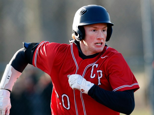 Crown Point's Eric Santaguida doubles against Griffith in the fourth inning during a baseball game on April 1, 2022. (John Smierciak / Post Tribune)