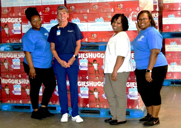 Franciscan Health's Prenatal Assistance Program recently received 400,000 Huggies diapers to support its Diaper Pantries. Pictured on delivery day are, from left, Community Health Prenatal Care Program Manager, Prenatal Assistance and Supplementary Diaper Pantry Programs Doucette Alvarez; Prenatal Care Coordinator Christine Gesiakowski, Community Health Specialist Carol Caruthers and Prenatal Care Coordinator and A'onesty Cross, Prenatal Care Coordinator, Prenatal Assistance and Diaper Pantry. (Photo courtesy of Franciscan Health)