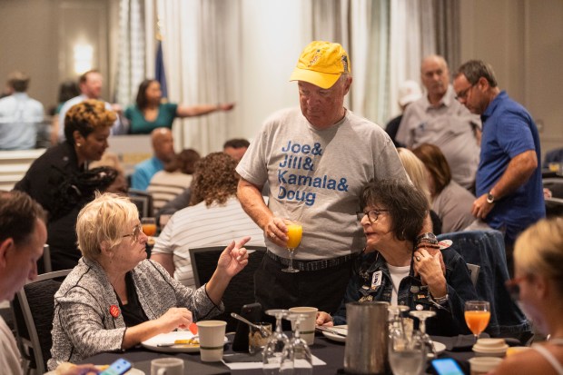 Karen Tallian, left, talks with other delegates at a breakfast for Indiana Democrats, on Monday, Aug. 19, 2024, in Chicago. (Vincent D. Johnson/for the Post-Tribune)