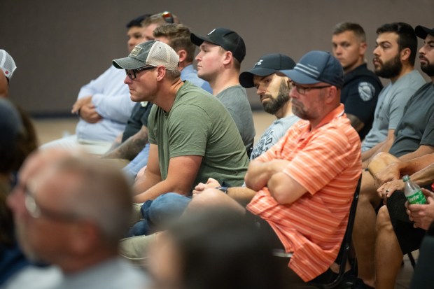 Fire and police personnel listen during a public safety forum with Porter County candidates to talk about the adoption of a public safety tax on Thursday, Aug. 22, 2024. (Kyle Telechan/for the Post-Tribune)