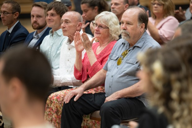 Family of newly-appointed Valpariso University athletic director Laurel Hosmer look on during a conference to announce her new title on Monday, Aug. 26, 2024. (Kyle Telechan/for the Post-Tribune)