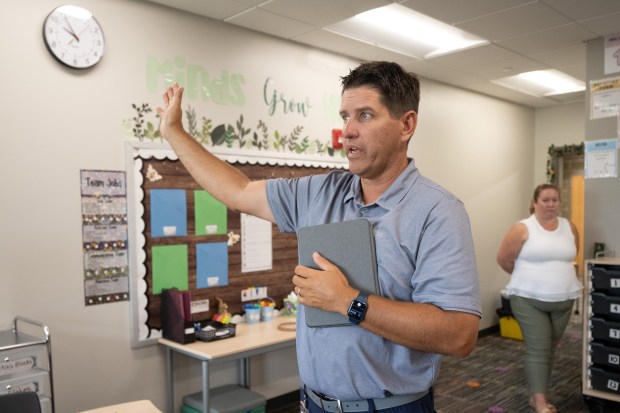 Duneland School Corporation superintendent Chip Pettit points out features in a 4th grade classroom during a tour of the newly-built Yost Elementary School in Porter on Thursday, Aug. 1, 2024. (Kyle Telechan/for the Post-Tribune)