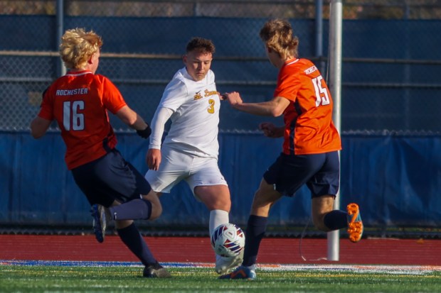 St. Laurence's Matthew Suchecki (3) clears the ball during the IHSA Class 3A third-place game in Hoffman Estates on Saturday Nov. 4, 2023. (Troy Stolt for the Daily Southtown)