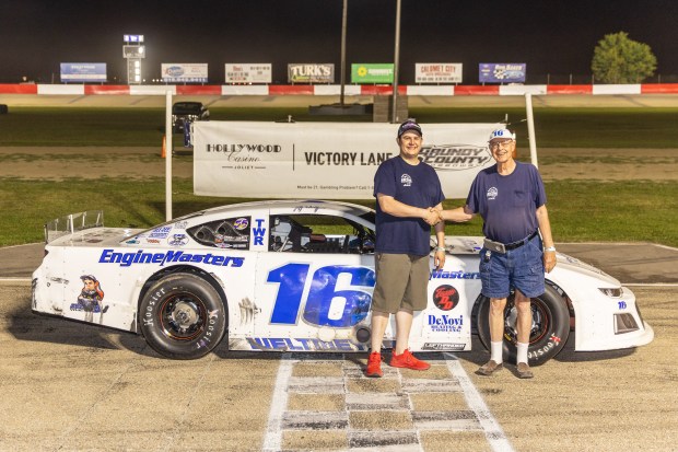 Bob Doherty and D.J. Weltmeyer celebrate in victory lane on championship night at Grundy County Speedway on Saturday, Sept. 10, 2022. (Chris Goodaker / Daily Southtown)