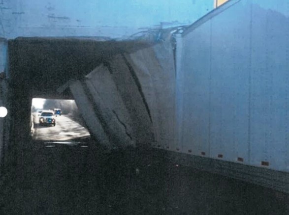 A photo from Olympia Fields police shows a truck damaged after a pass under the Vollmer Road. (SHARPwatch)