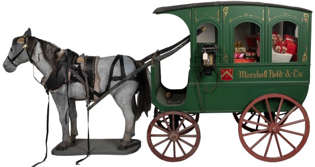 A horse-drawn wagon used in the 1992 holiday window displays at Marshall Field's on State Street in Chicago is among a group of automatons being auctioned in September by Potter & Potter Auctions in Chicago. (Potter & Potter Auctions)