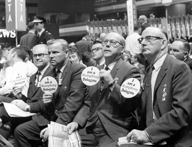 Everything was coming up roses for Vice President Hubert Humphrey as the Democratic National Convention opened at the Amphitheater in Chicago on Aug. 26, 1968. This is a section of Minnesota delegates. (Chicago's American)