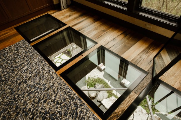 The Treetop Silo Spa has glass floor panels that looks down on the botanical garden below. (Bunker Hill Farms)