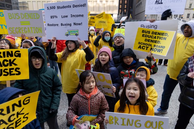 The CPS Parents for Buses coalition rallies to support bringing back bussing and transportation allowances for Chicago Public Schools students who lost access this year Tuesday, Feb. 6, 2024, in Daley Plaza. (Brian Cassella/Chicago Tribune)