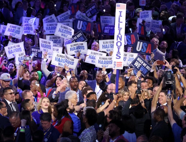 Illinois delegates, including Gov. JB Pritzker at lower right, cast ceremonial votes for Vice President Kamala Harris and Minnesota Gov. Tim Walz at the United Center on Aug. 20, 2024 as the Democratic nominees for president and vice president. (Terrence Antonio James/Chicago Tribune)