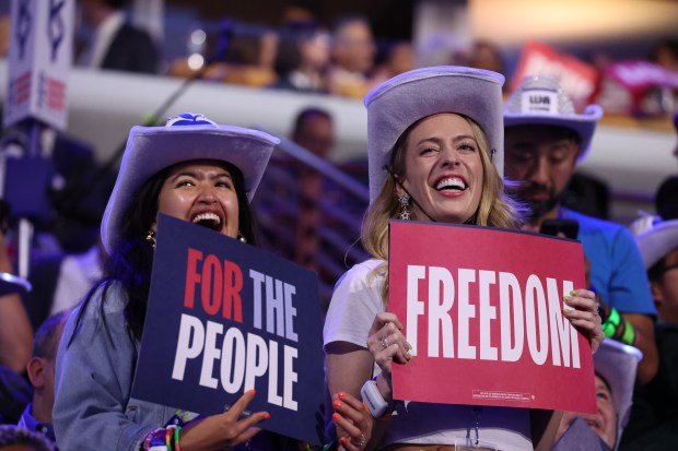 Washington delegates listen to Sen. Tammy Duckworth on Aug. 20, 2024, during the Democratic National Convention at the United Center. (Terrence Antonio James/Chicago Tribune)