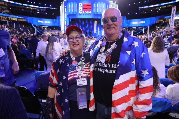 Sue and Donn Larson, both South Dakota at-large delegates, on Aug. 22, 2024, during the Democratic National Convention at the United Center. (Terrence Antonio James/Chicago Tribune)