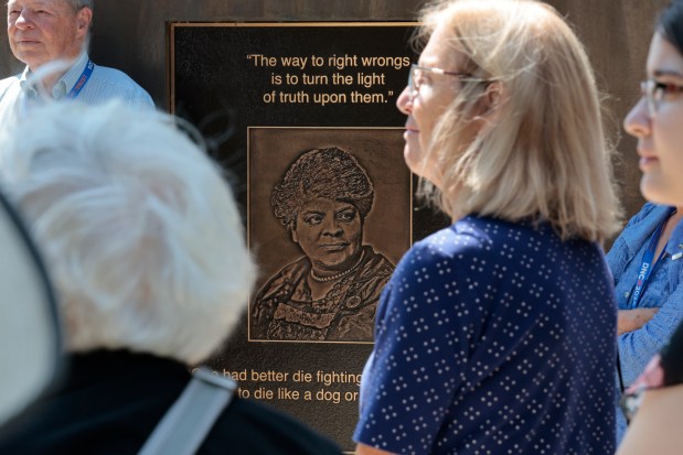 Democratic National Committee delegates visit the Light of Truth Ida B. Wells National Monument as they take a tour of Bronzeville, Aug. 19, 2024. (Antonio Perez/Chicago Tribune)