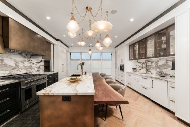 This four-bedroom brownstone at 77 E. Cedar St. in the Gold Coast is a new-construction home. (Eric Stassman and Jasko Omerovic)