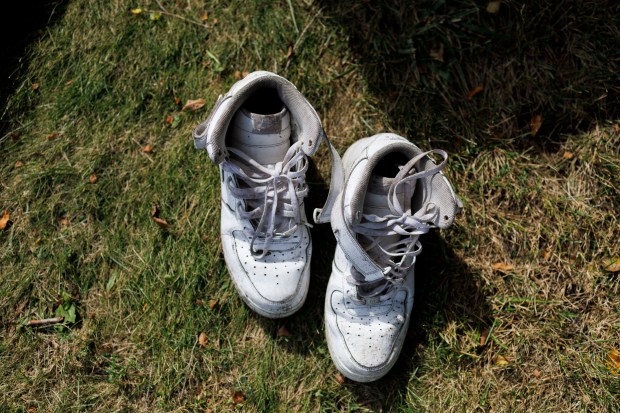 Joseph Palamara's shoes dry in the sun by his tent near DuSable Lake Shore Drive and West Wilson Avenue after a storm passed through the area the previous day on Aug. 28, 2024, in Chicago. (Armando L. Sanchez/Chicago Tribune)