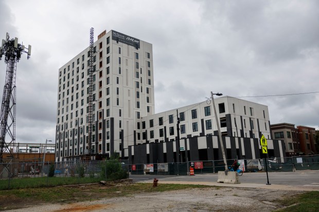 A partially built Westhaven Park building, of which over a third of the units will be reserved for the Chicago Housing Authority, sits on North Damen Avenue on Tuesday, Aug. 6, 2024, in Chicago. Westhaven Park was built in place of the Henry Horner public housing complex. (Armando L. Sanchez/Chicago Tribune)