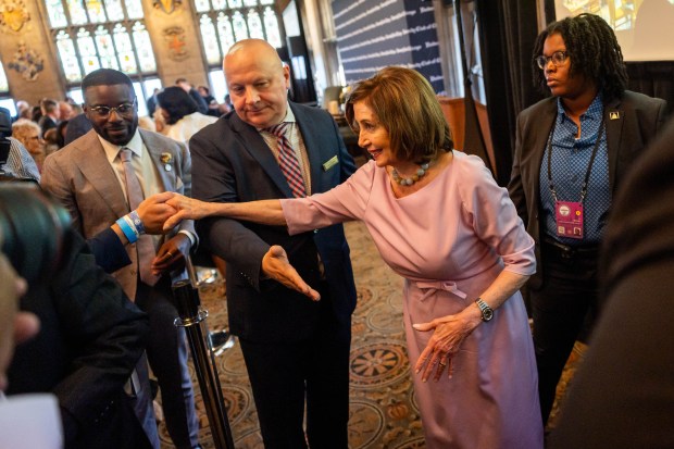 Former U.S. House Speaker Nancy Pelosi walks off the stage after speaking with Democratic political strategist and CNN commentator David Axelrod at the University Club of Chicago on Aug. 21, 2024. (Tess Crowley/Chicago Tribune)