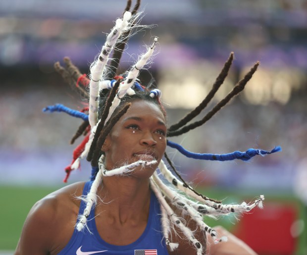 USA's Tori Franklin takes a bow to the crowd after coming up short in her third attempt in the women's triple jump qualifier on Aug. 2, 2024, at Stade de France during the Paris Olympics. (Brian Cassella/Chicago Tribune)