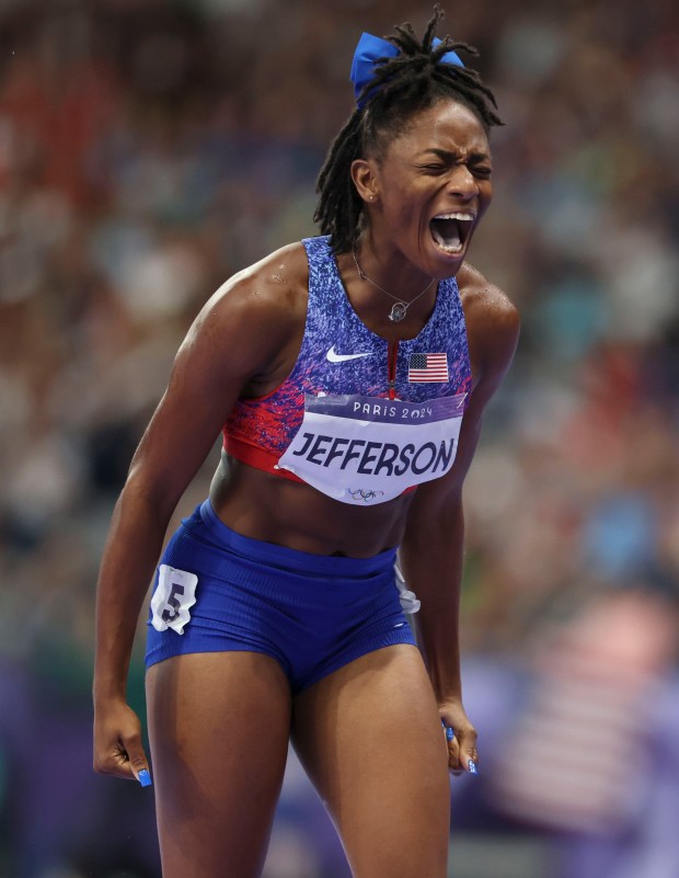 USA's Melissa Jefferson celebrates her bronze medal in the women's 100-meter dash, Aug. 3, 2024, at Stade de France during the Paris Olympics. (Brian Cassella/Chicago Tribune)