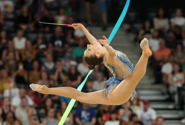 USA's Evita Griskenas competes on the ribbon in the rhythmic gymnastics individual all-around Thursday, Aug. 8, 2024, at La Chapelle Arena during the Paris Olympics. (Brian Cassella/Chicago Tribune)