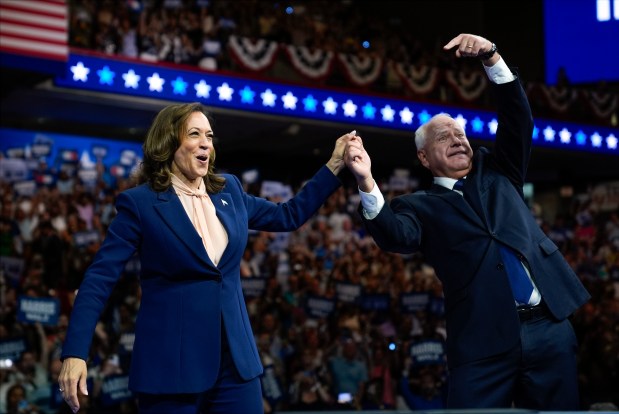 Democratic presidential nominee Vice President Kamala Harris and her running mate Minnesota Gov. Tim Walz speak at a campaign rally in Philadelphia on Aug. 6, 2024. (Matt Rourke/AP)