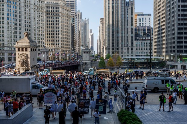 Activists gather near North Michigan Avenue to protest the Democratic National Convention on Aug. 18, 2024, in Chicago. (Armando L. Sanchez/Chicago Tribune)