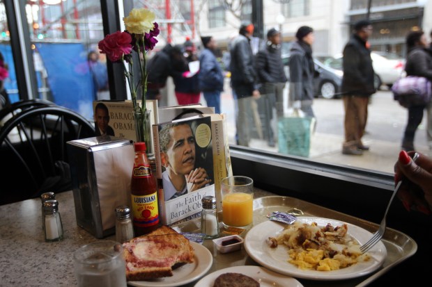 A copy of President Obama's book sits on a table at Valois restaurant in President Obama's neighborhood in Chicago on Nov. 7, 2012. The restaurant served breakfast for free in honor of Obama's win. (Nancy Stone/Chicago Tribune)