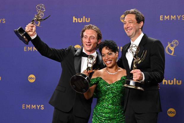 Jeremy Allen White, left, Liza Colon-Zayas and Ebon Moss-Bachrach pose in the press room with their awards for their roles in "The Bear" during the 76th Primetime Emmy Awards at the Peacock Theater in Los Angeles on Sunday, Sept. 15, 2024.