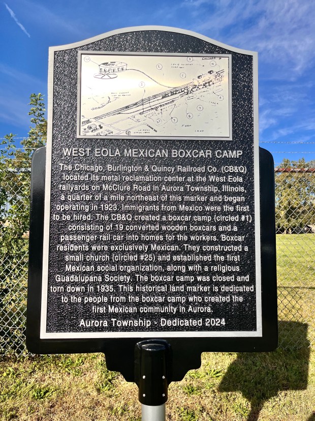 The new historical marker honoring the history of the West Eola Mexican Boxcar Camp in Aurora Township offers information on the camp, which was dismantled in the mid-1930s. (Alejandro Benavides)