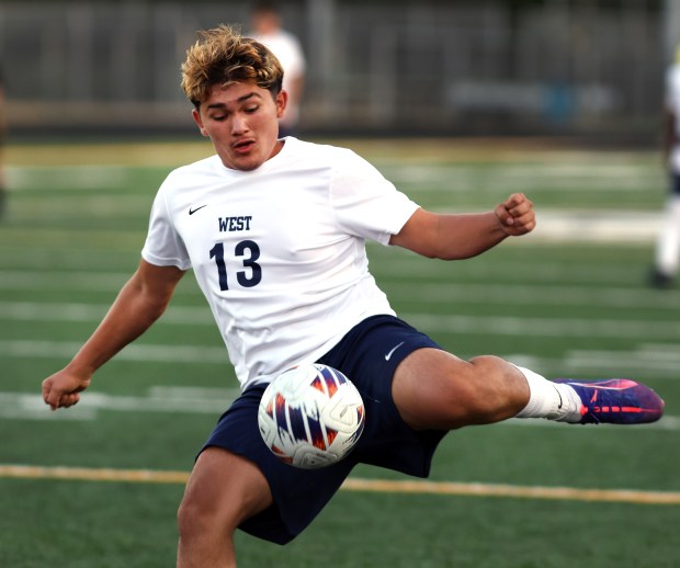 West Aurora's Sebastian Delgado shoots to the goal during a boys soccer game against Elmwood Park in Elmwood Park on Tuesday, Sept. 3, 2024. (James C. Svehla / Pioneer Press)