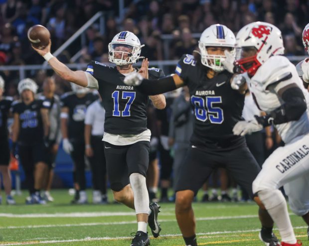 Aurora University's Tyler Adkins (17) looks to pass against North Central College during a nonconference game at Spartan Athletic Park in Montgomery on Saturday, Sept. 14, 2024. (Troy Stolt / The Beacon-News)