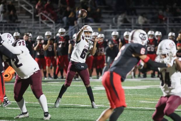 Elgin's Dward Ward (6) throws a pass against East Aurora during an Upstate Eight conference game in Aurora on Friday, Sept. 27, 2024. (Troy Stolt / The Beacon-News)