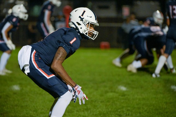 Oswego's Jeremiah Cain (1) lines up on the d-line against Plainfield North in Oswego on Friday, Sept. 27, 2024. (Mark Black / The Beacon-News)