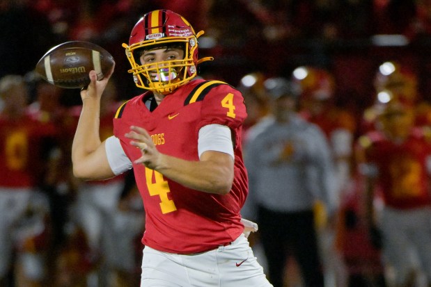 Batavia quarterback Bodi Anderson (4) passes the ball against South Elgin during a game in Batavia on Friday, Sept. 6, 2024. (Mark Black / The Beacon-News)