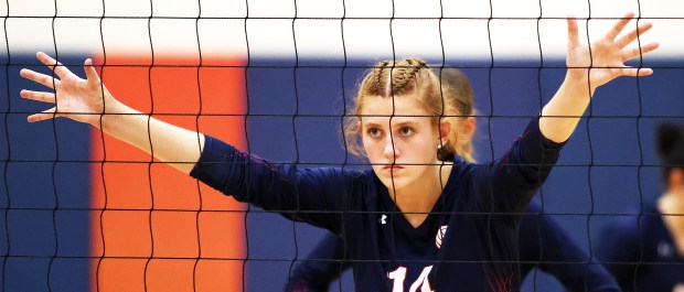 South Elgin's Grace Bach (14) waits for a serve from Lake Park during an non-conference match in South Elgin on Thursday, Sept. 5, 2024. (H. Rick Bamman / The Beacon-News)