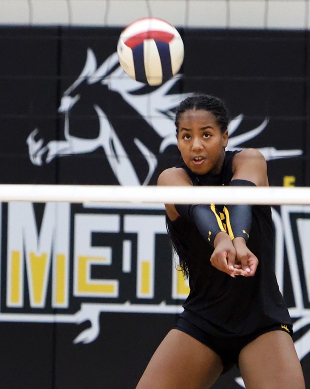 Metea Valley's Addison Torain saves the ball during game against Yorkville in Aurora on Wed, Sept. 11, 2024. (James C. Svehla / Beacon News)